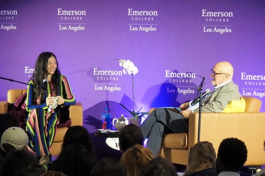 Filmmaker Chloe Zhao and Glenn Meehan '83 sit in chairs in front of an audience|Filmmaker Chloe Zhao and Glenn Meehan '83 sit in chairs in front of an audience